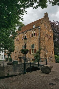 Medieval Groot Tinnenburg House and Stone Bridge in Amersfoort, Netherlands