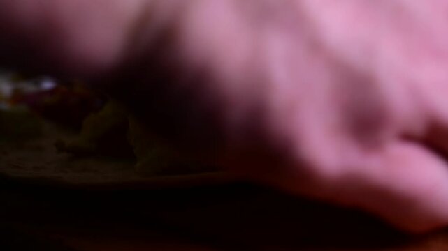 background video breakfast burrito wrapping food in tortilla, close up bokeh food backgrounds, close up