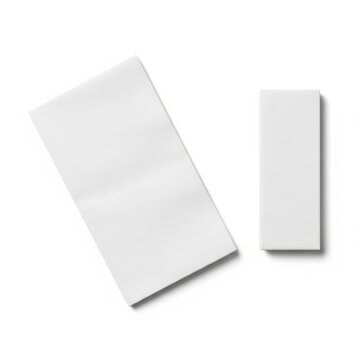 Two pieces of plain white paper napkins displayed against a white background