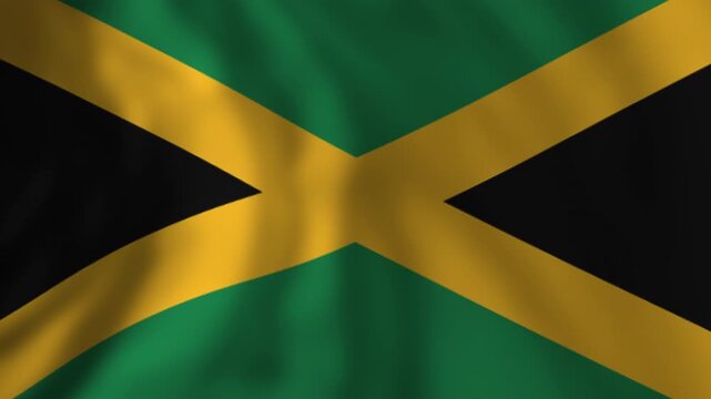 Waving jamaican national flag flying in the wind