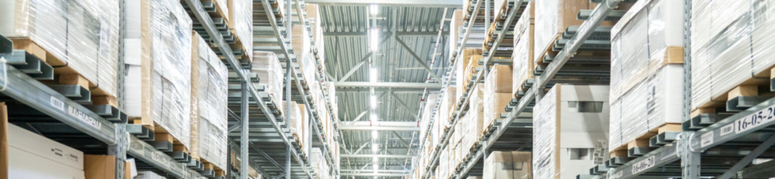 Rows of shelves with boxes in Ikea store in Moscow