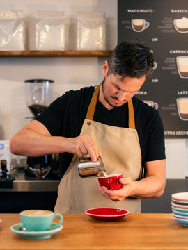 Barista is making cappuccino at coffee shop 