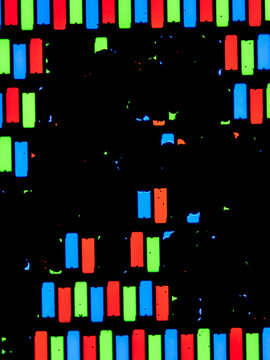 Microscopic view of damaged LCD screen with RGB subpixels