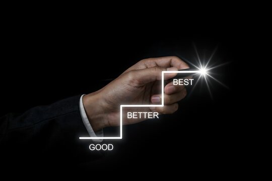 Hand drawing a glowing staircase graph showing progress from good to better to best level
