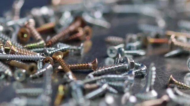 Metal mounting screws close-up. Macro image.