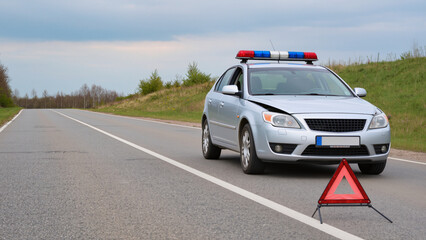 Obraz premium ​Car Breakdown on Highway, Emergency Warning Triangle, Roadside Assistance, Vehicle Mechanical Failure, Open Hood Auto Trouble, Stalled Car on Rural Road, Traffic Safety Sign