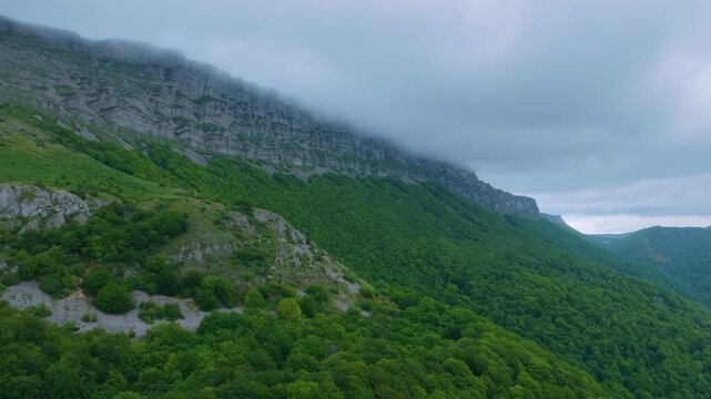 Aerial drone view of the spring landscape around the Lizarraga and San Donato mountain passes in the Sierra de Urbasa Natural Park. Navarre, Spain. Europe