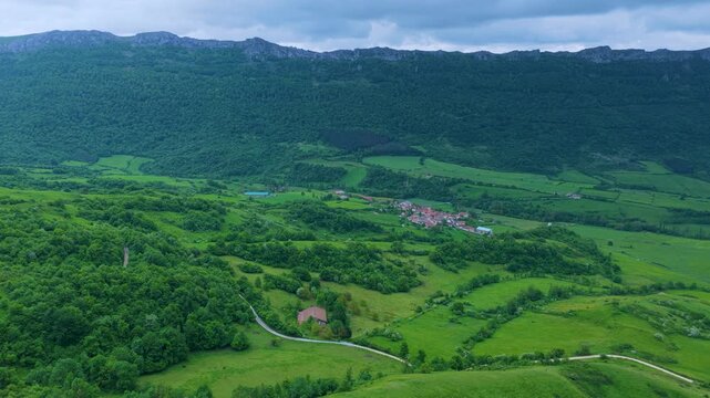 Aerial drone view of the spring landscape around the Lizarraga and San Donato mountain passes in the Sierra de Urbasa Natural Park. Navarre, Spain. Europe