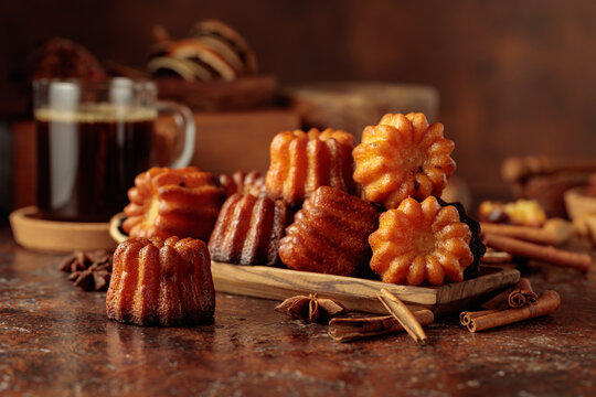 Cinnamon cakes and mug of black coffee.