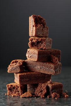 Brownie on a black stone table.