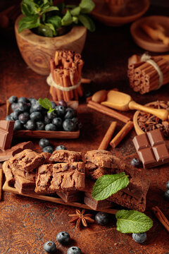 Brownie with blueberries and mint.