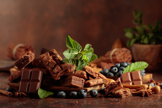 Brownie with blueberries and mint.
