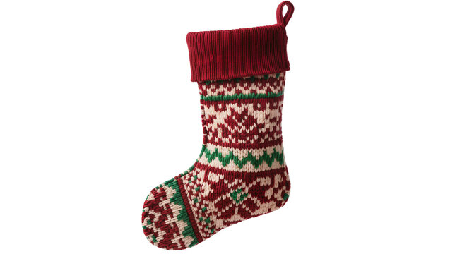 Knitted Christmas stocking with red cuff and fair isle pattern, isolated on transparent background