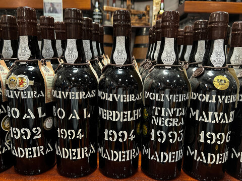 Bottles of wine on a store shelf. Close-up. Funchal. Madeira. Portugal.