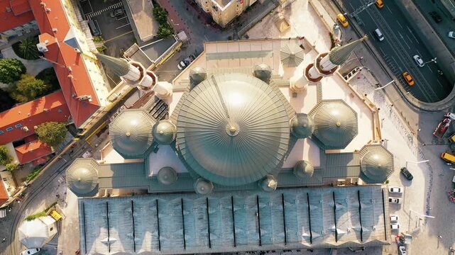 Istanbul Taksim Square mosque top view aerial drone shot. Bird's eye view of modern Islamic architecture dome, geometric design and central plaza.