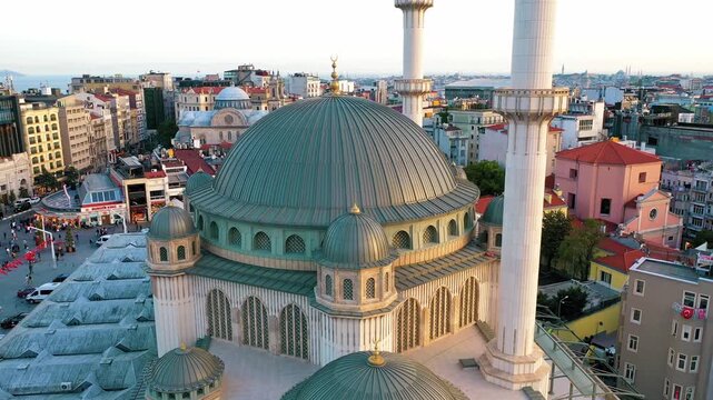 Taksim Mosque aerial drone shot in Istanbul Beyoglu. Panoramic view of modern Islamic architecture landmark, Taksim Square and cityscape.