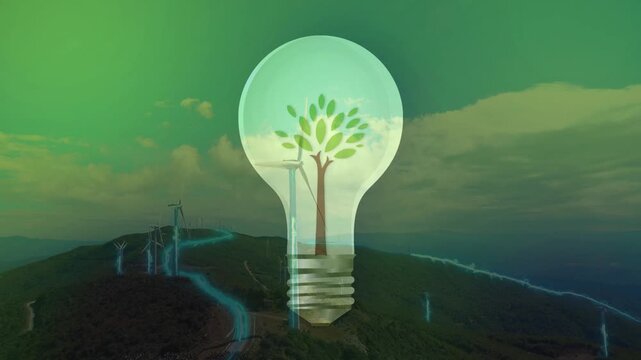 A glowing lightbulb overlay containing a wind turbine and a small tree, superimposed on a landscape with actual wind turbines and digital network lines. Represents clean and green energy ideas.