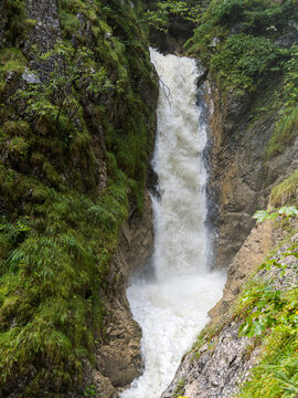 Waterfall along the Wolfsklamm gorge carved by the Stanserbach River, Tyrol, Austria