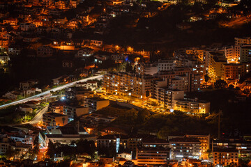 Fototapeta premium Funchal, Madeira, Portugal. Vibrant capital city of Madeira Island featuring scenic coastal views, colorful architecture, picturesque harbor, and a unique blend of history, culture, and natural beauty