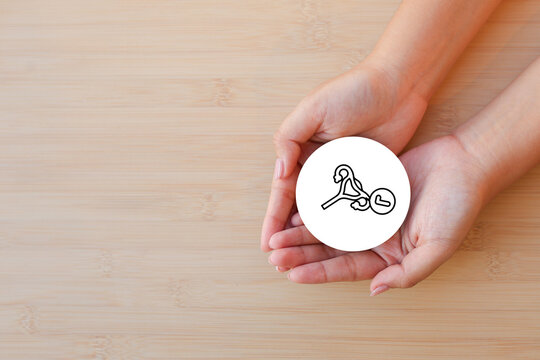 close up gynaecologist woman hand show symbol of uterus for heath about feminine diagnosis , women's hormone  and wellness concept