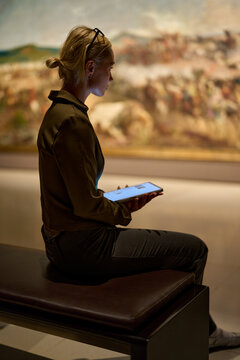 Women in the museum looks at art exhibitions gallery