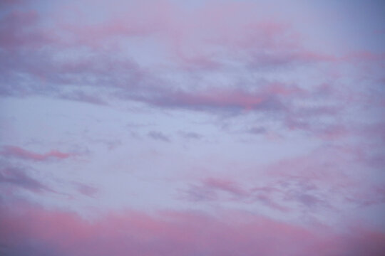 pastel winter sky with pink and purple clouds