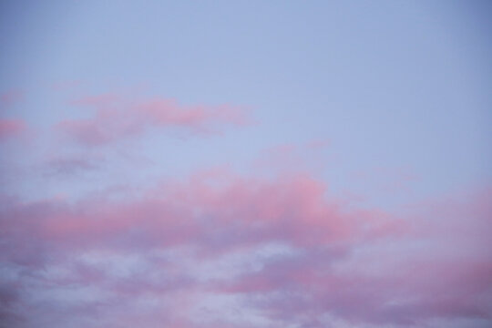 pastel winter sky with pink and purple clouds