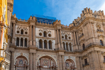 Obraz premium View at the Malaga Cathedral or Santa Iglesia Catedral Basílica de la Encarnación, an iconic national landmark ,16th-century baroque facade