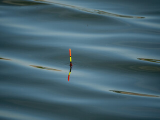 fishing float on the water © Iryna Diadechko