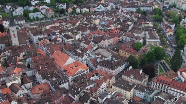 Aerial panoramic view above the old town around the city Chur in Switzerland on a sunny summer afternoon. 