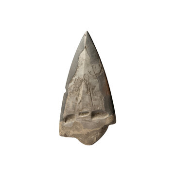 Ancient stone arrowhead made of gray flint