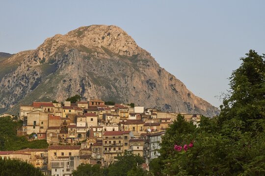 Evening light, mountain, village on hill, close, Militello Rosmarino, village, Nebrodi National Park, Sicily, Italy