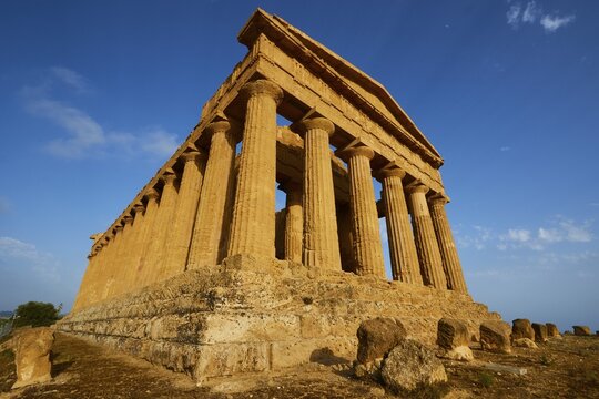 Evening light, super wide angle shot, complete temple, front and side, Concordia temple, valley of the temples, valle dei templi, Agrigento, Sicily, Italy
