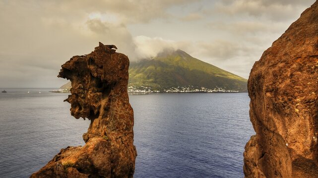 Strombolichio, small volcanic rock island off Stromboli, view through bizarre lava rocks, Stromboli, mountain, volcano, volcanic island, Stromboli, Aeolian Islands, Lipari Islands, Sicily, Italy