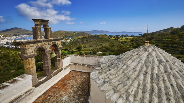 View from the roof with a view of the bell tower and landscape towards the blue sea, Monastery of the Revelation, Moni tis Apokalipsis, World Heritage Site 1999, Patmos, Dodecanese, Greek Islands, Greece