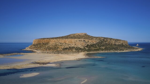 Aerial view of a rocky island with shallow coastline and blue water, Gramvoussa, Gramvoussa peninsula, Pirate Bay, Balos, lagoon, north-west Crete, Crete, Greek Islands, Greece