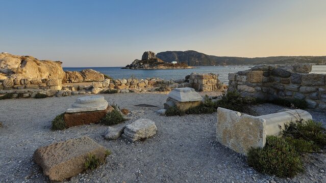 View of ancient ruins by the sea with an island in the background, Agios Stefanos Beach, Agios Stefanos Basilica, Basilica, Kastri Island, Kos, Dodecanese, Greek Islands, Greece