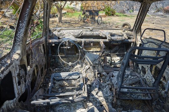 Interior of a burnt car, completely devastated and charred, depicting the utter destruction, forest fires, summer 2023, forest fire damage, Boutique 5 Hotel, Kiotari, Rhodes, Rhodes, Dodecanese, Greek Islands, Greece