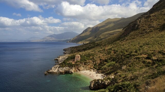 Coastline, green hills, green bay, small beach, blue cloudy sky, Zingaro, national park, nature reserve, northwest, Sicily, Italy