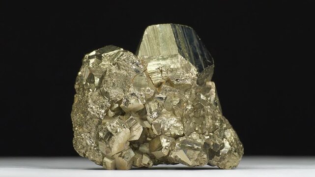 Pyrite - mineral, shiny iron sulfide in natural crystal form, also known as fools gold
