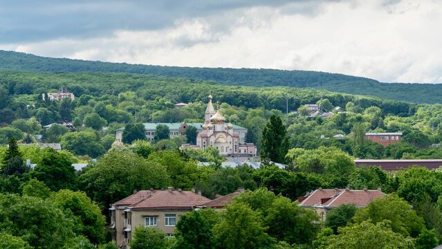 Inozemtsevo, Russia &mdash; May 30, 2026: View of the Church of the Beheading of John the Baptist in Inozemtsevo, Russia, showing Orthodox church architecture, domes, crosses, religious details, and village