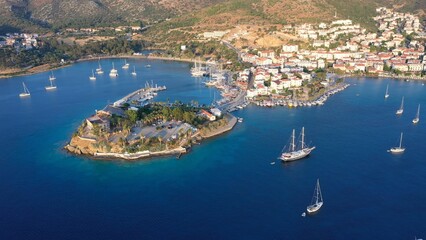 A stunning aerial view of Datça, Turkey. Amphitheater Peninsula separates Holiday village to two main beaches. Tranquil waters and anchored yachts enhance the idyllic scene © Faraways