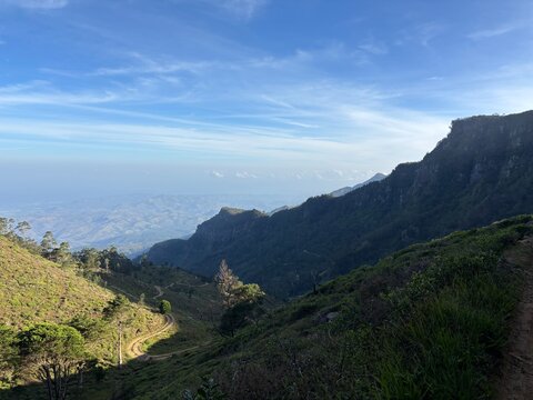 Panoramic view of lush mountain ranges and tropical valleys under a clear blue sky in Devil&rsquo;s Staircase Sri Lanka