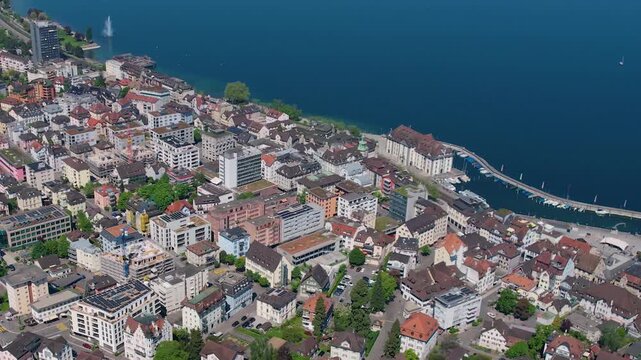 Aerial panoramic view above the downtown beside the city Rorschach in Switzerland on a sunny summer noon. 