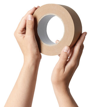 Woman holding roll of masking tape on transparent background, closeup