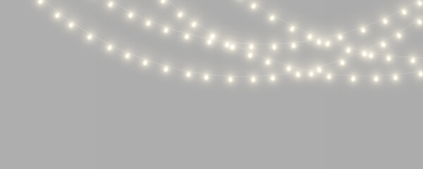 Christmas lights border PNG with glowing bulbs and elegant decoration. Great frame element for winter invitations, cards and posters. © dedstock