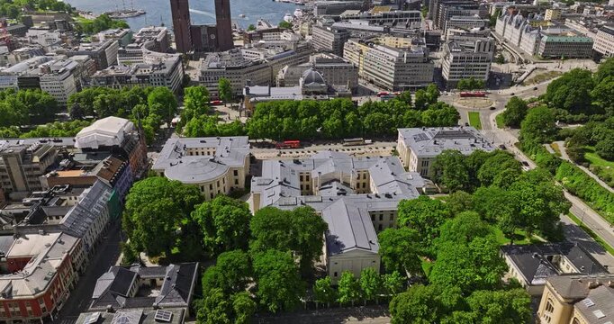 Oslo Norway Aerial v40 birds eye view drone flyover university campus, turning right flying straight above the path leading to Karl Johan monument and royal palace - Shot with Mavic 3 Cine - June 2022