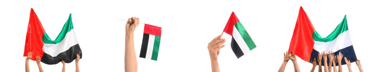Fototapeta premium Hands holding and waving United Arab Emirates flags