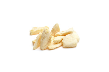 Fototapeta premium Freeze-dried melon fruit crisps arranged on a white background, showcasing their unique texture and shape, ideal for healthy snacking or culinary use