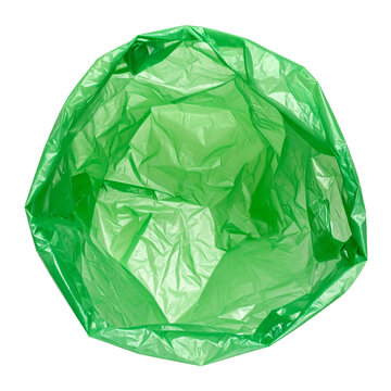 Green plastic trash bag open for waste collection top view isolated object with wrinkled texture and vibrant color details shown&nbsp;